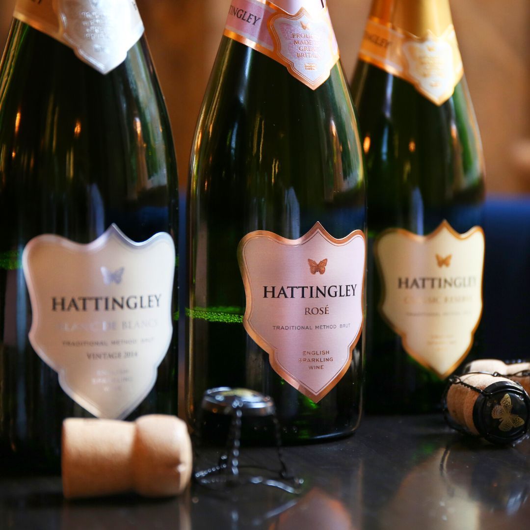 The Hattingley Valley Core Collection, Blanc de Blancs, Sparkling Rosé, Classic Reserve, open bottles on a table 