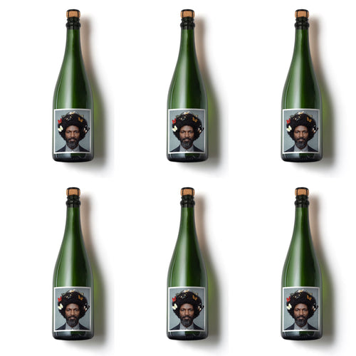 Six bottles of English Gent Traditional Method Sparkling Wine on a white background. Bacchus and Pinot Gris blend.