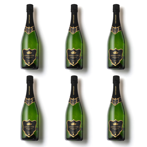 Six bottles of Hattingley Valley Kings Cuvée sparkling wine with a black label, gold accents, on a white background