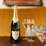 Hattingley Valley Personalised Classic Reserve, engraved bottle, gift personalisation, wine gifts, classic cuvée. lifestyle image, luxe hotel background