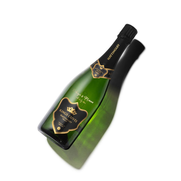 A bottle of Hattingley Valley Kings Cuvée with engraved text 