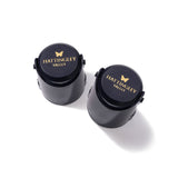 Two Hattingley Valley Branded Sparkling Wine Bottle Stoppers, navy stoppers with a reflective gold butterfly logo. How long does open champagne last?