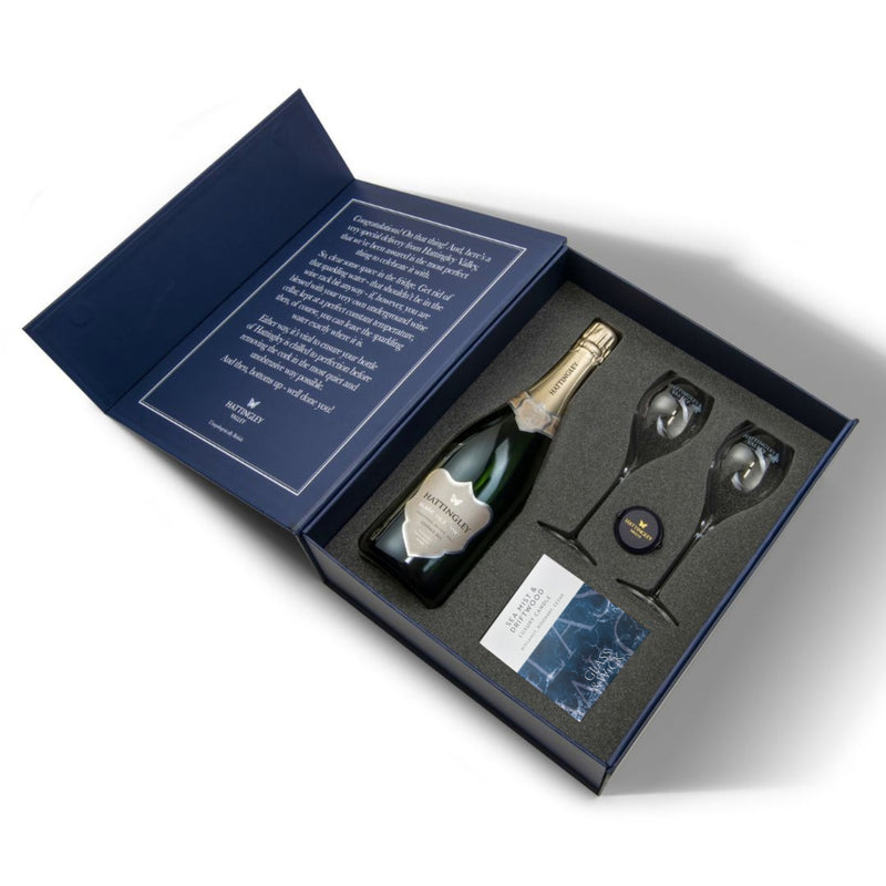 Hattingley Valley luxury gift set with candle, Hattingley Valley award winning Blanc de Blancs, Hattingley glass flutes, wine glasses, champagne flutes, champagne bottle stopper, Glass & Wick Sea mist and drift wood candle 