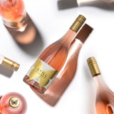 An image showing multiple bottles of Hattingley Valley STILL Rosé from different angles with a total of six bottles