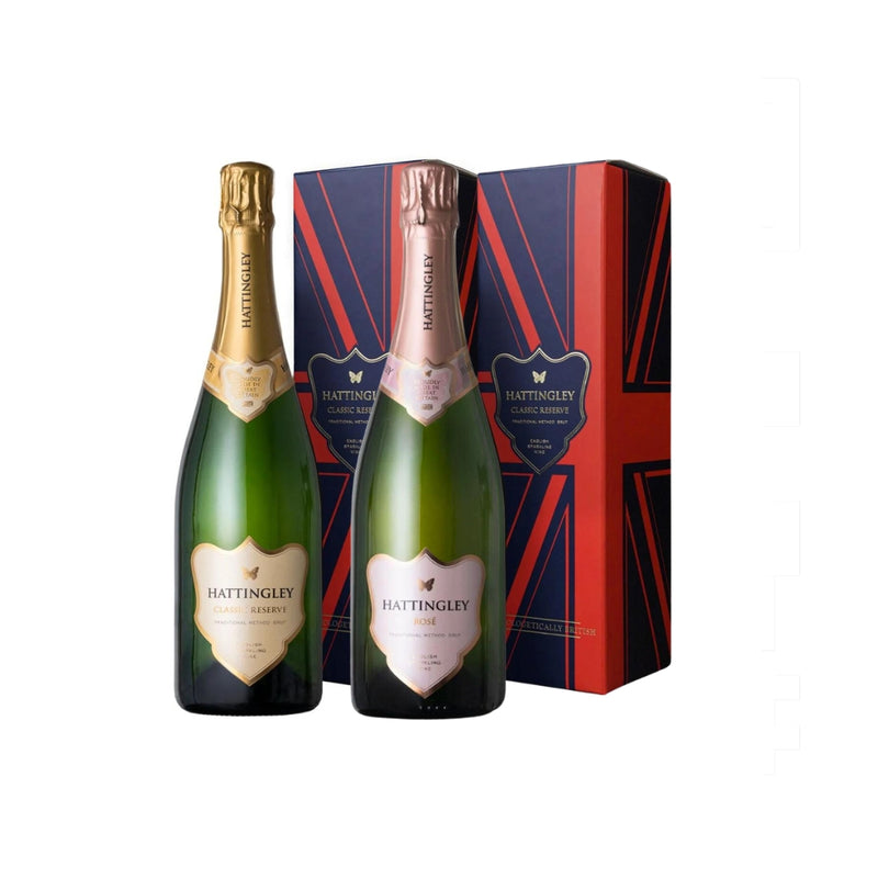 Christmas duo of English Sparkling Wines Hattingley Valley Classic Reserve and English Sparkling Rosé beside two union jack gift boxes on a white background