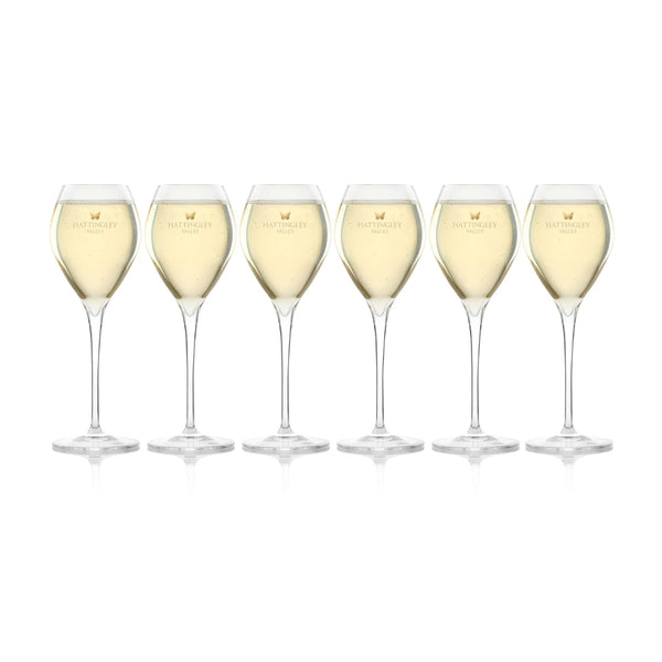 Hattingley Valley Tulip Flutes (Glasses Full), glasses are branded with the Hattingley Valley logo and butterfly. Fine glassware for drinking at home or giving as the perfect wine gift.