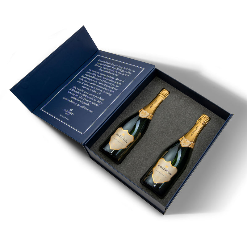 Hattingley Valley luxury gift box set. Open gift box displaying two bottles of Hattingley Valley Classic reserve. 