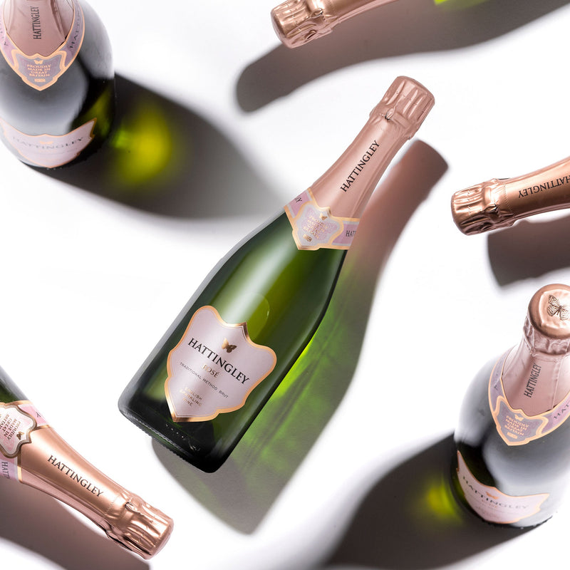 Hattingley Valley Rosé 2019, premium English sparkling wine case, multiple bottles at different angles