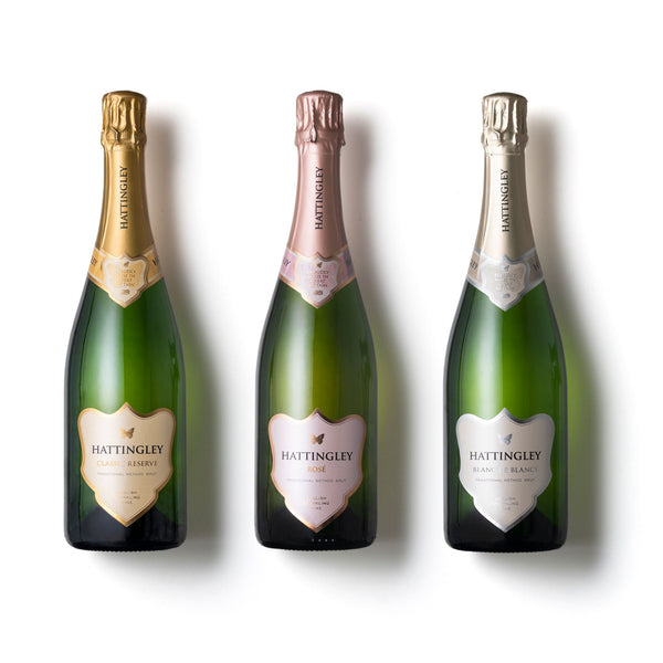 Hattingley Valley Giftboxed Trio - Classic Reserve, Sparkling Rosé, Blanc de Blancs. Bottle images, one of each of our selection of three premium english sparkling wines on a white background.
