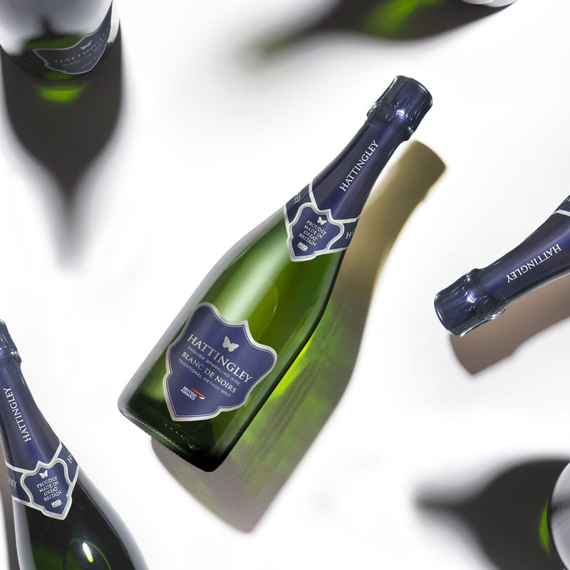 Hattingley Valley for British Airways Blanc de Noirs Case, image of multiple bottles at an different angles, casting a shadows on the white background