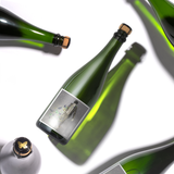 Susie and Peter's Hope and Glory Blanc de blanc 2016 case image, multiple bottles photographed at various angles, casting shadows on the white background
